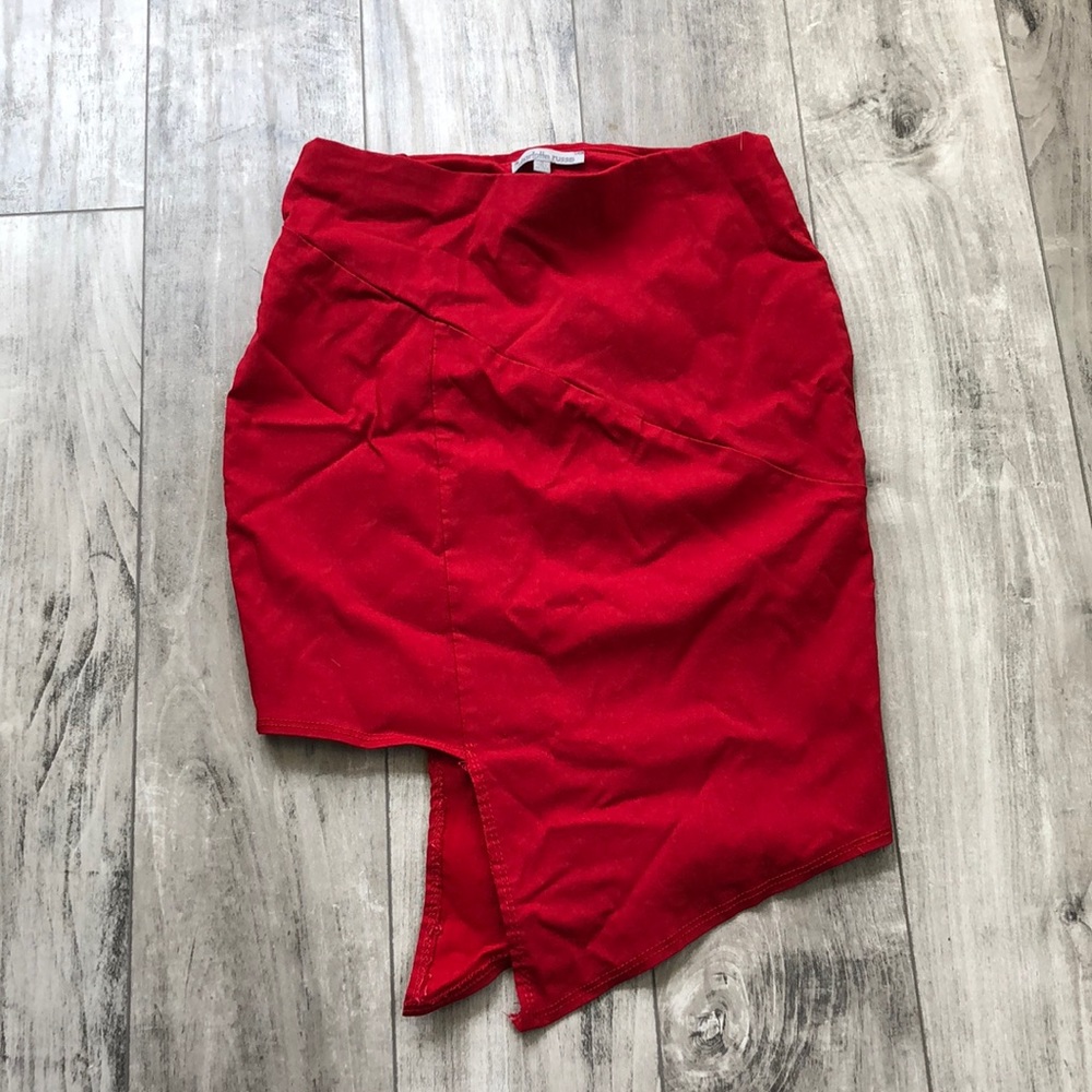 Red asymmetrical mini skirt